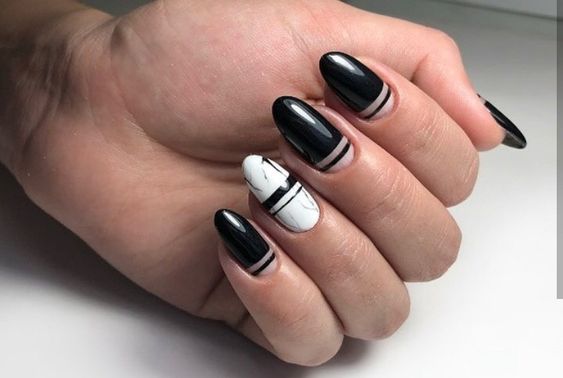 unhas pretas com marmorizado branco