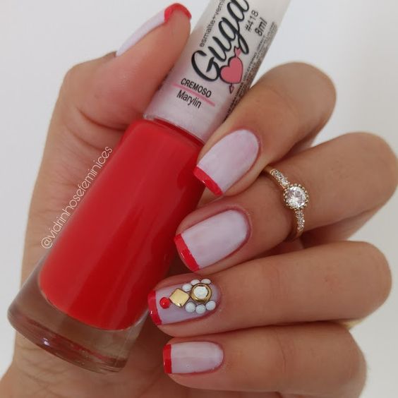 unhas decoradas com inglesinha vermelha