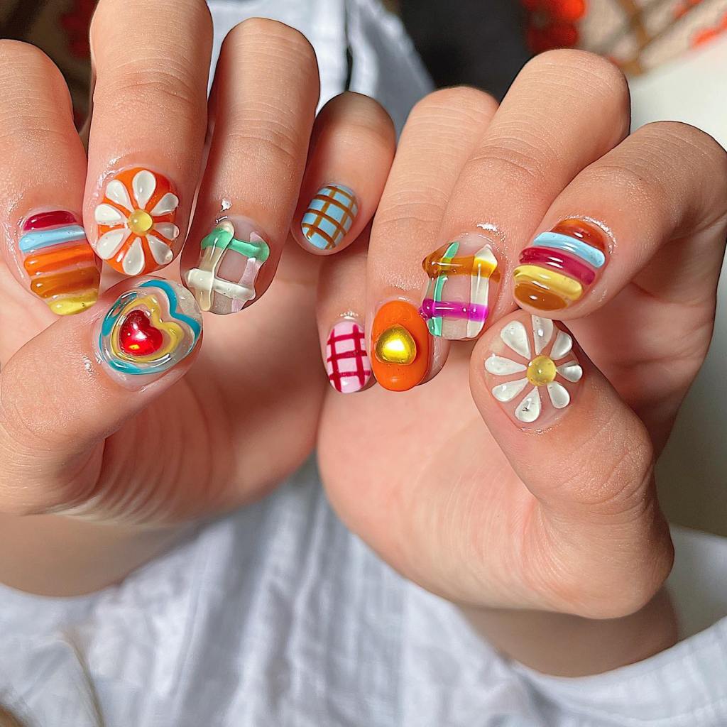 Inspiração de jelly nails 3D coloridas e divertidas