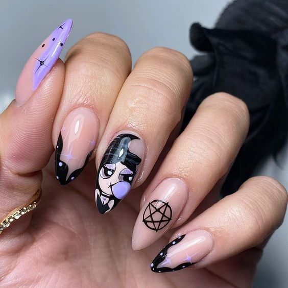 Foto de unhas pintadas com bruxinhas para halloween