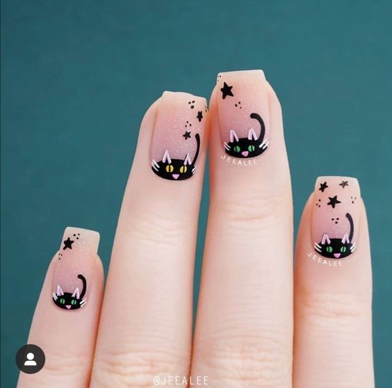 Foto de unhas decoradas com gatinhos halloween
