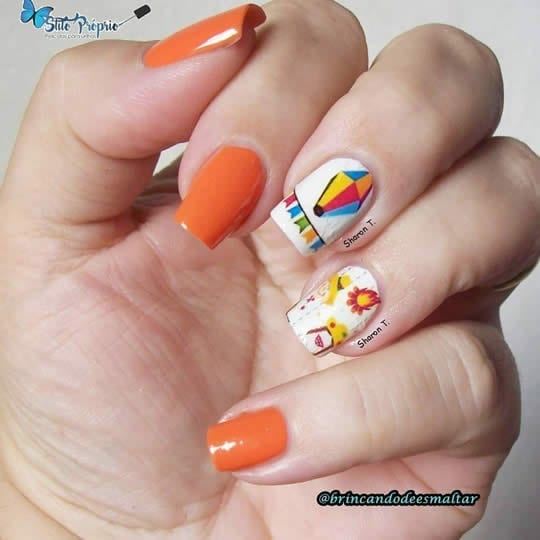 Modelo de unhas decoradas com balão para festa Junina