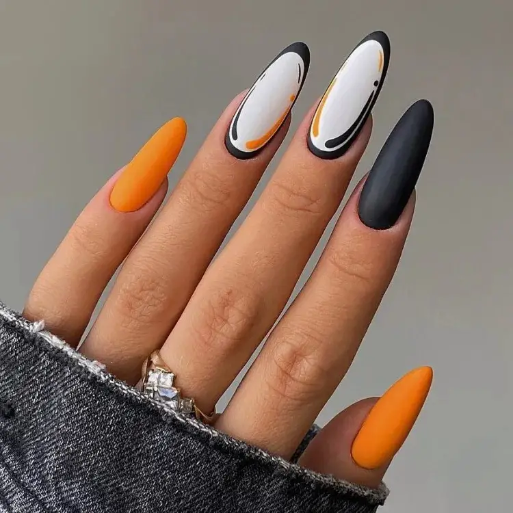 Comic nails preta com laranja foscas